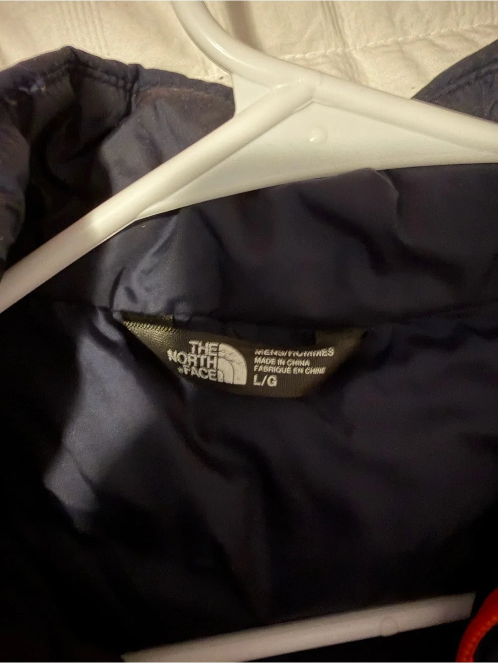 The North Face Blue Puffer Jacket with Orange Trim